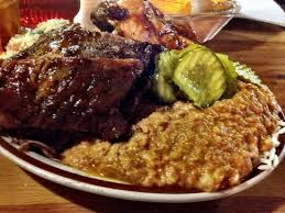 Sconyers Bar B Que signature dishes Chopped Pork, Sliced Beef Brisket, St. Louis Ribs, Hash and Rice
